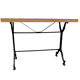 Old bistro table in engraved wrought iron