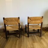 Pair of low wooden and straw armchairs