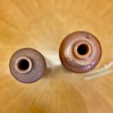 Set of two bottles or jugs in ocher-brown enamelled sandstone