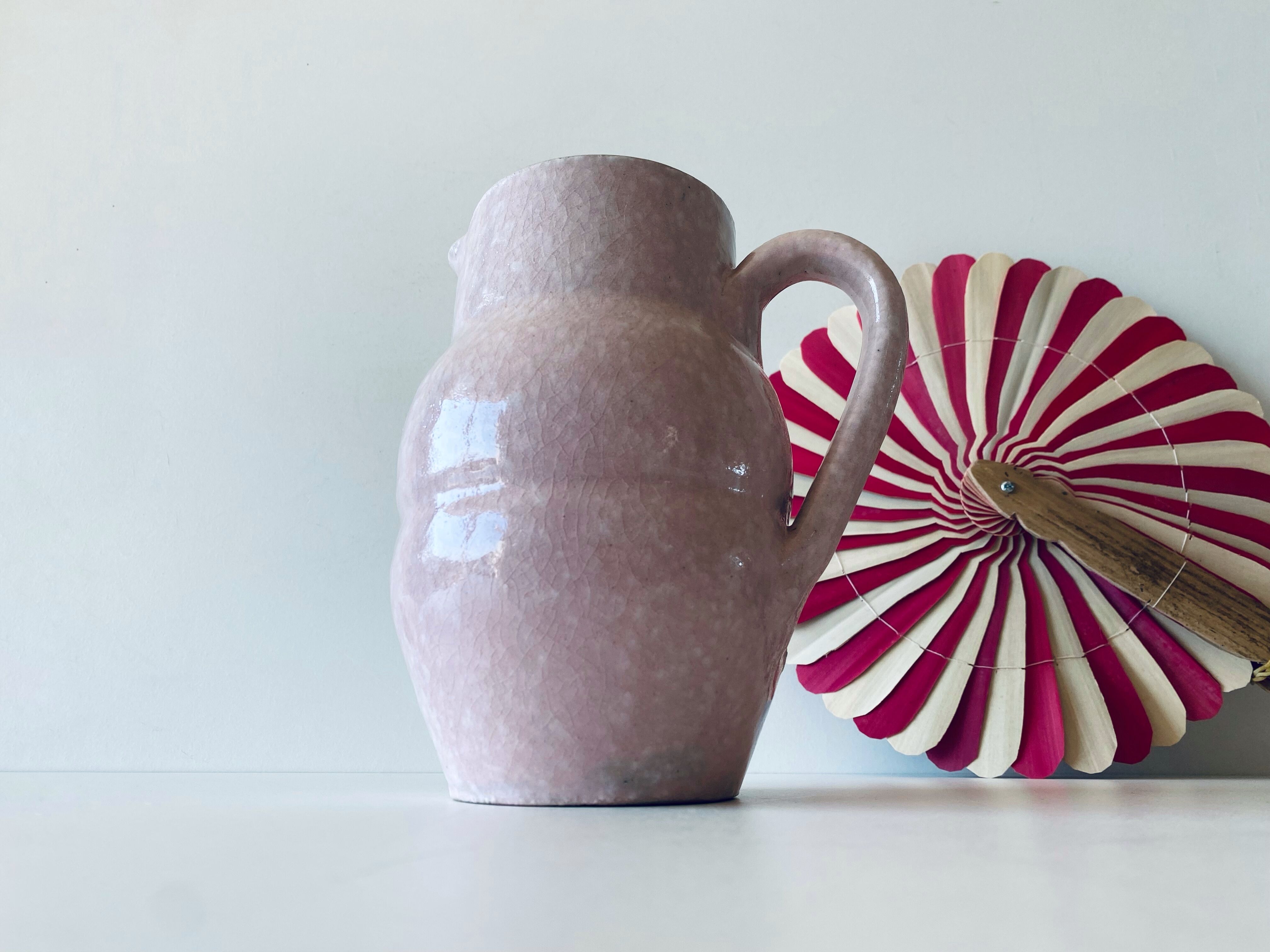 Pitcher in pink glazed ceramic