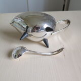 Angora tripod and silver metal spoon