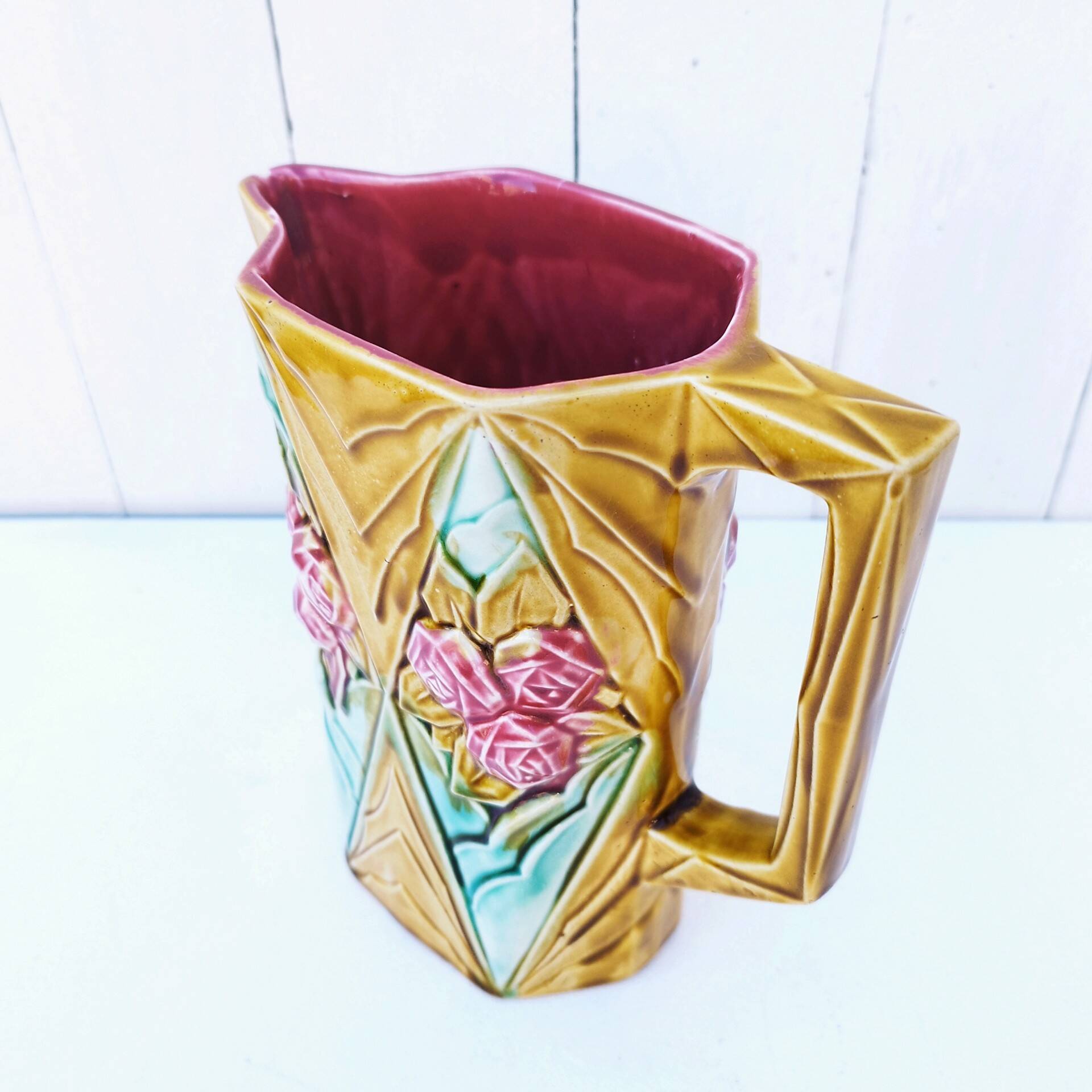 Vintage Onnaing slip rose pitcher