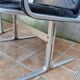Pair of vintage leather and aluminum armchairs, restored