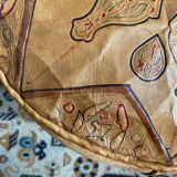 Pair of leather poufs