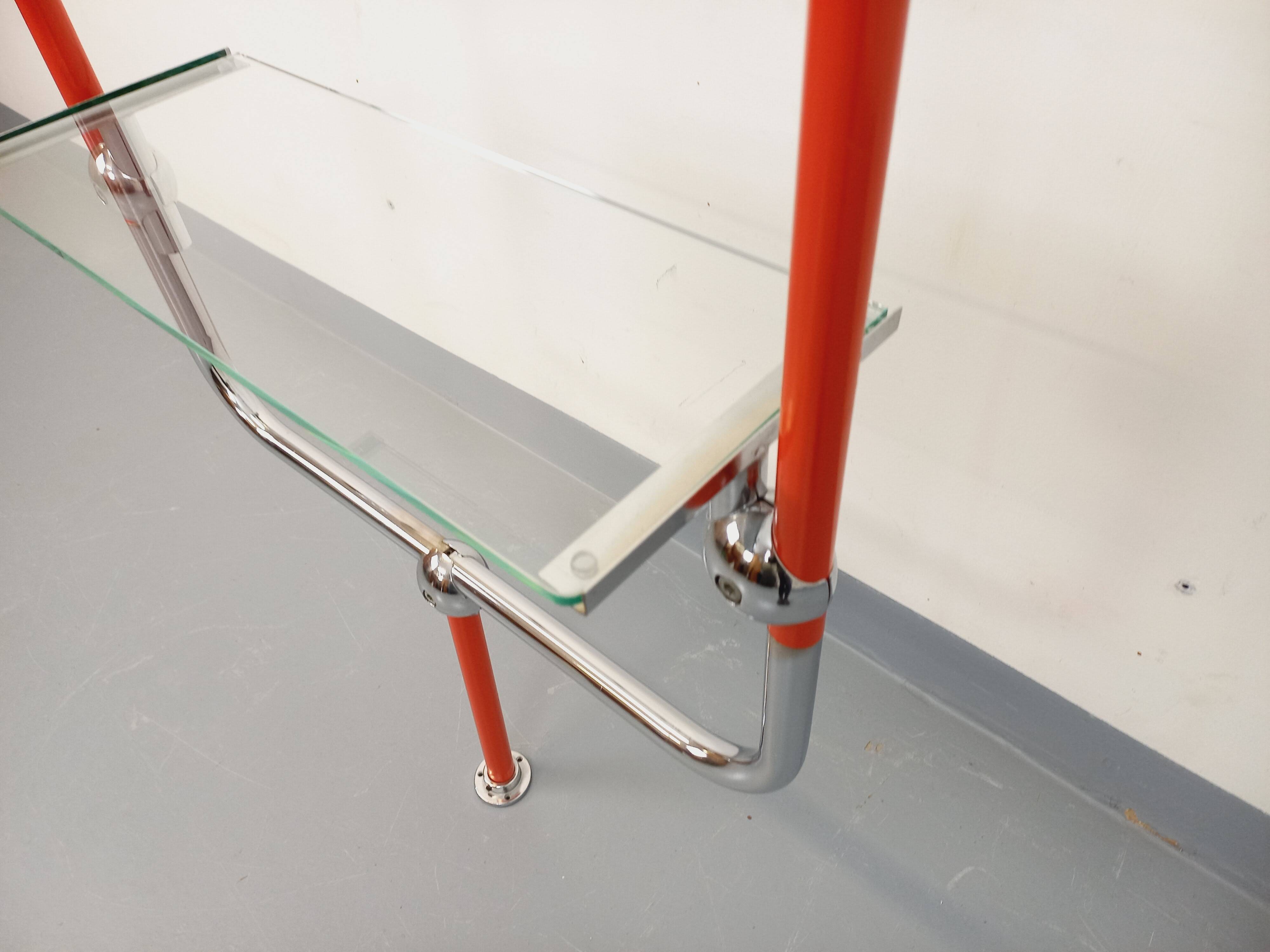 Modular bookshelf in vintage Bauhaus style, red metal, chrome.