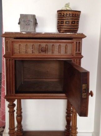 Old wooden bedside table and marble tray
