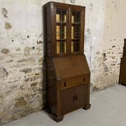Oak display secretary cabinet with drop-down front, two sections.