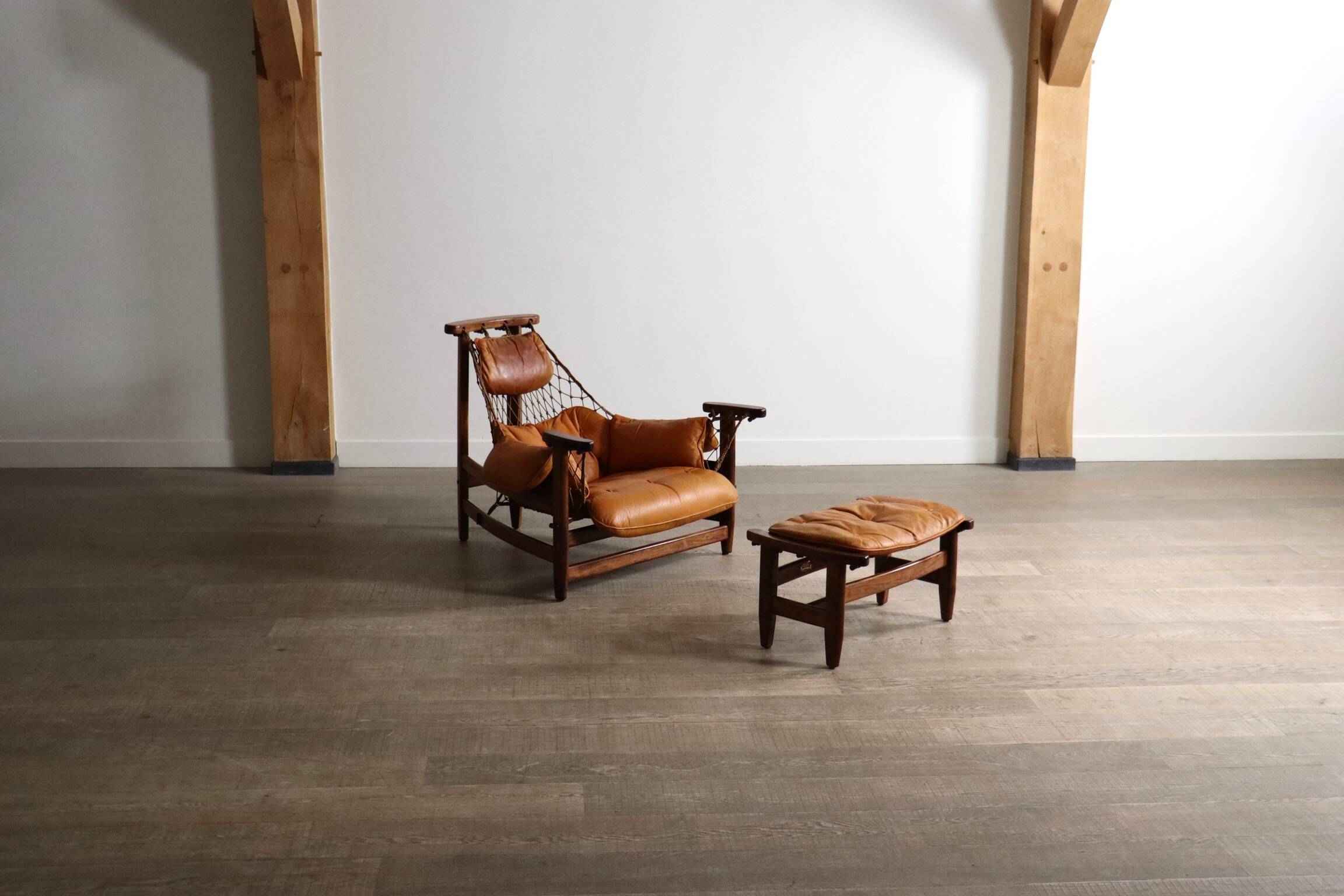 Jangada lounge chair with ottoman in cognac leather by Jean Gillon, Brazil, 1960s