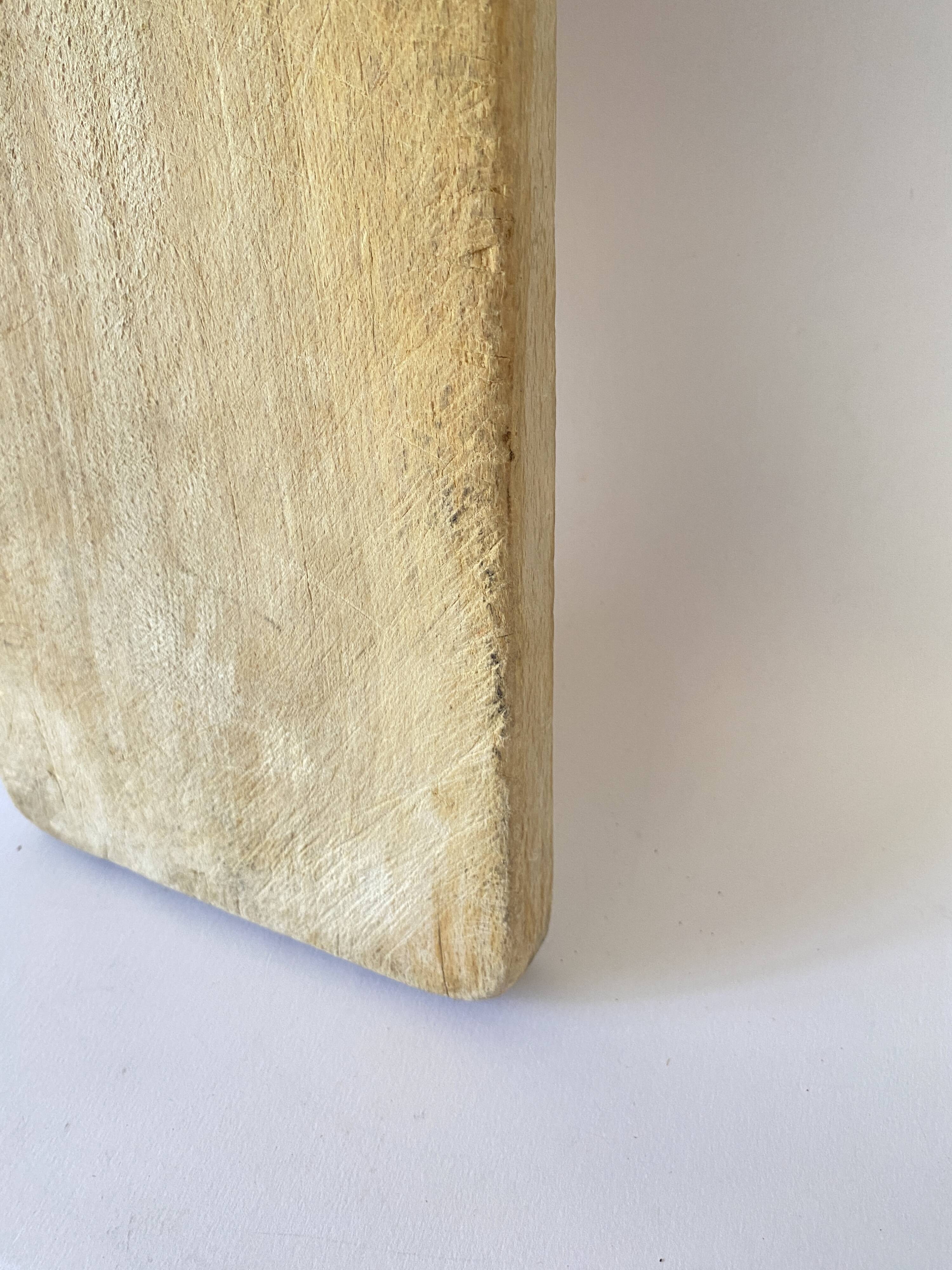 Butcher's cutting board with handle