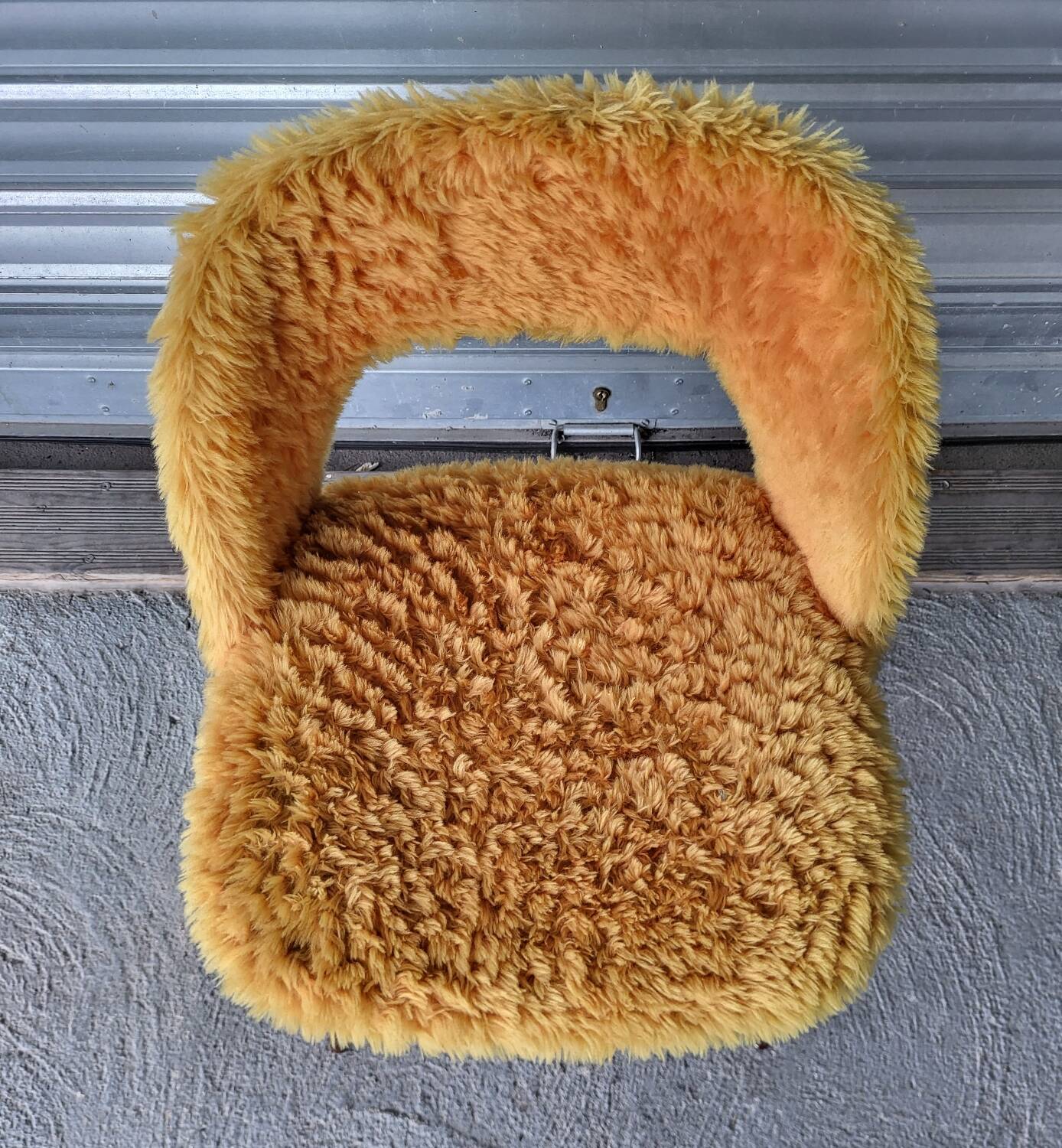 Authentic old vintage furry armchair in good condition