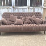 Padded velvet sofa