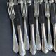 12 Forks and 12 cheese or dessert knives – Orfèvrerie Perrin Paris