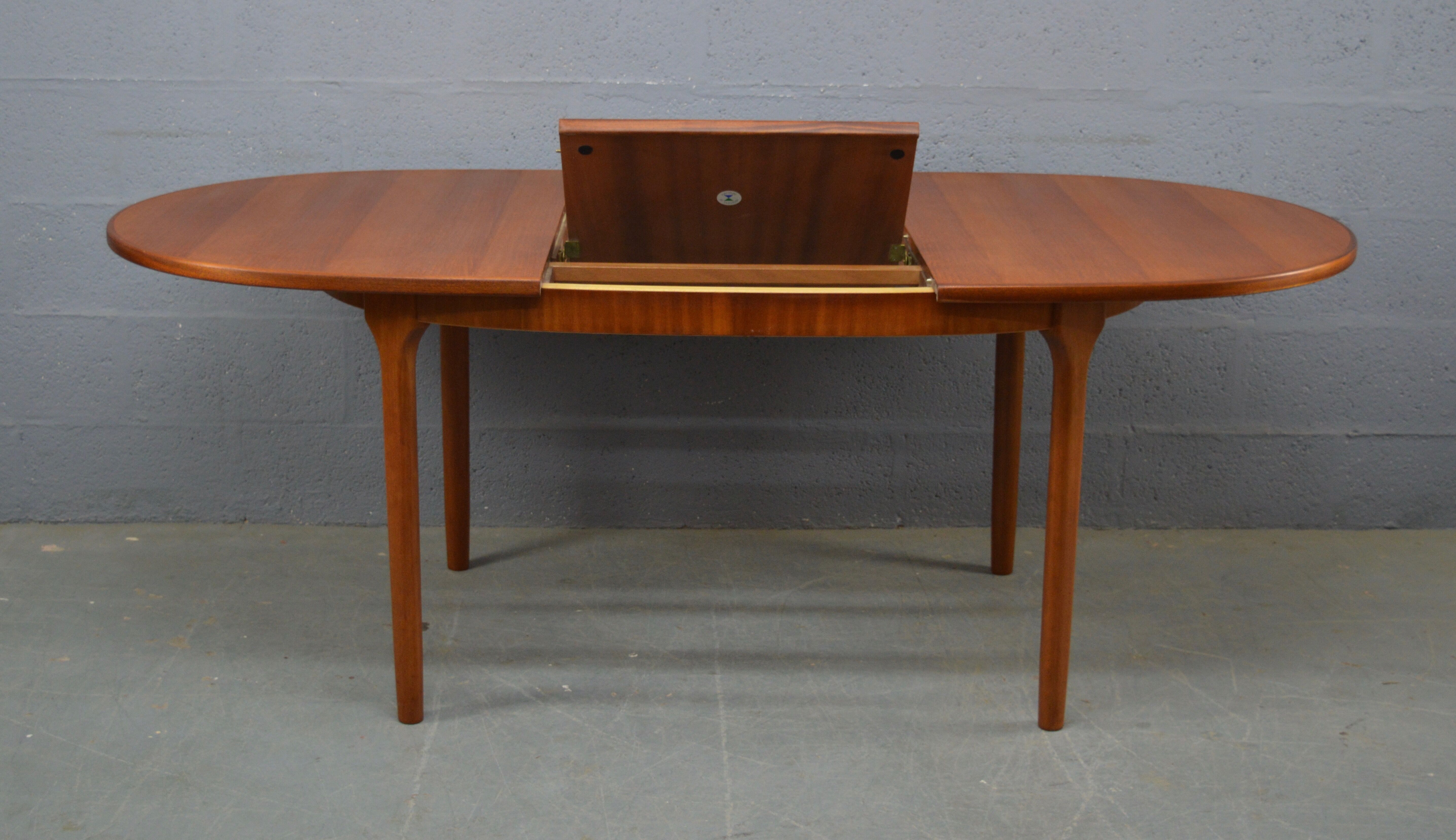 Mid century oval dinning table by Mcintosh