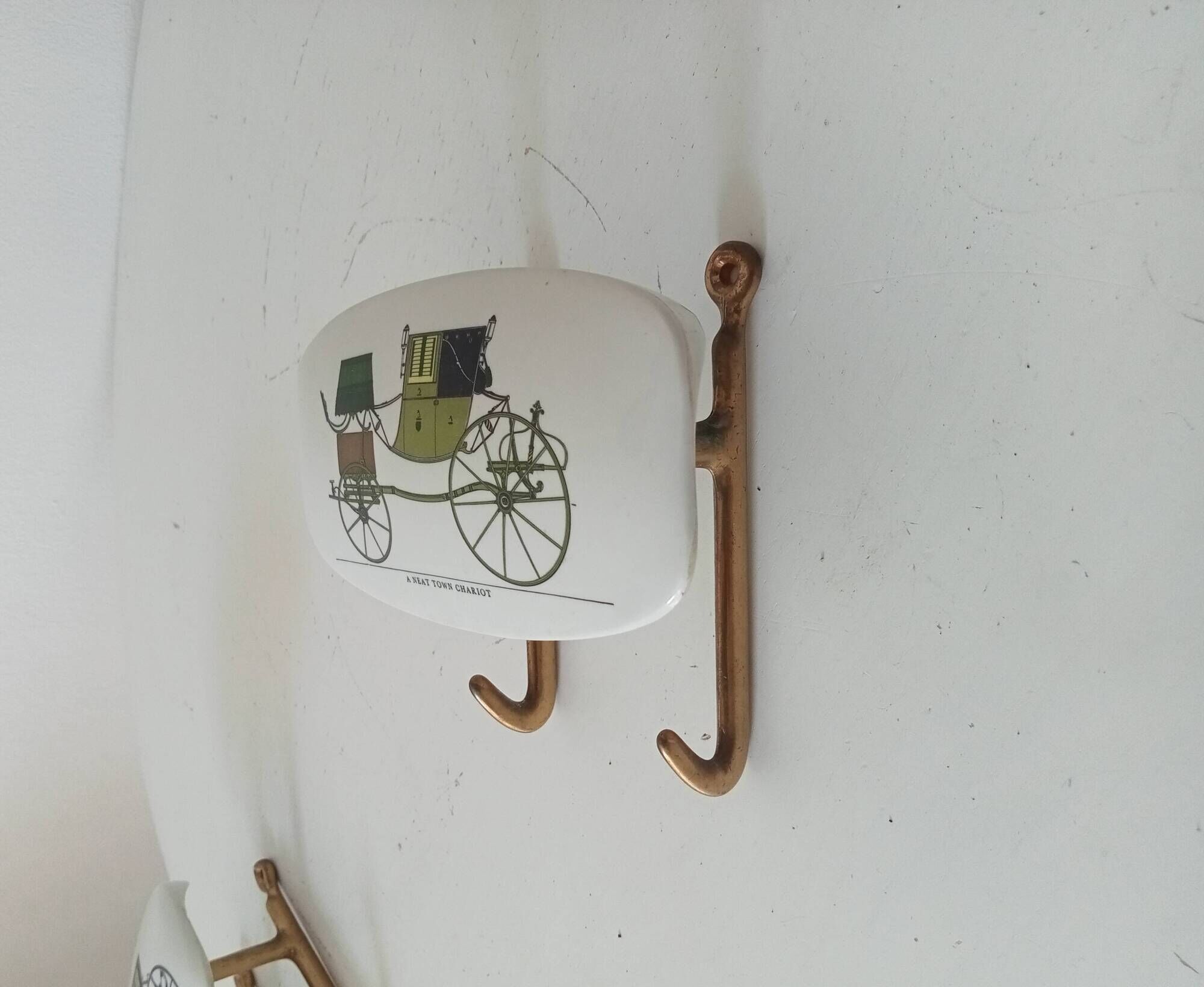 Set of 2 wall coat hooks in Bakelite and brass from the 1950s/60s.