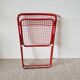 Chaise pliante en métal fil rouge