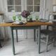 Table, vintage desk with smoked green legs and an oak top.