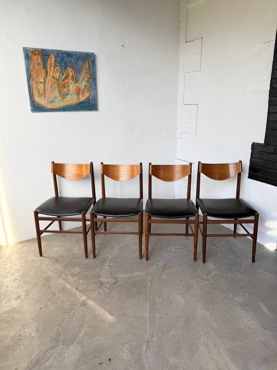 Set of 4 Italian chairs by Gianfranco Frattini.