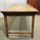 Early 20th-century farmhouse table made of fir, elm, and chestnut.