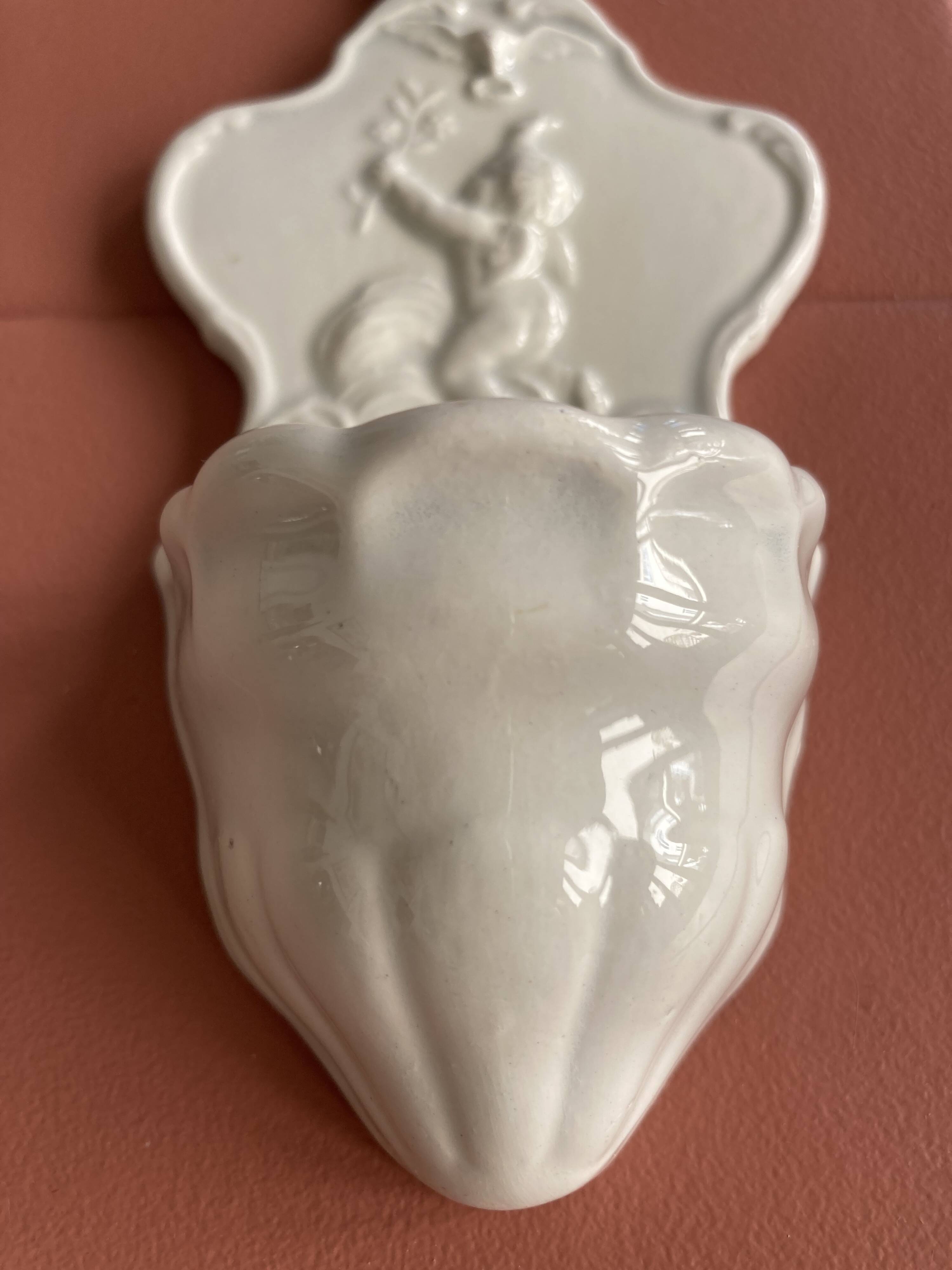 19th century porcelain angel holy water font