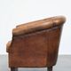 Vintage club chair in sheepskin leather with a characterful look