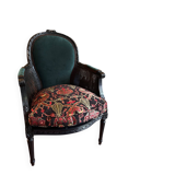 Louis XVI armchair with caning and dark green velvet