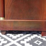 Flamed mahogany enfilade with sea green marble in Empire style.