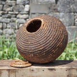 Old basket with lid, burgundy straw and bramble, woven basket, interior decoration