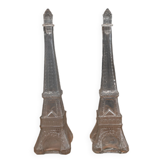 Two 1900 glass bottles representing the Eiffel Tower