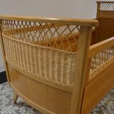 Child's bed in rattan of the years 50