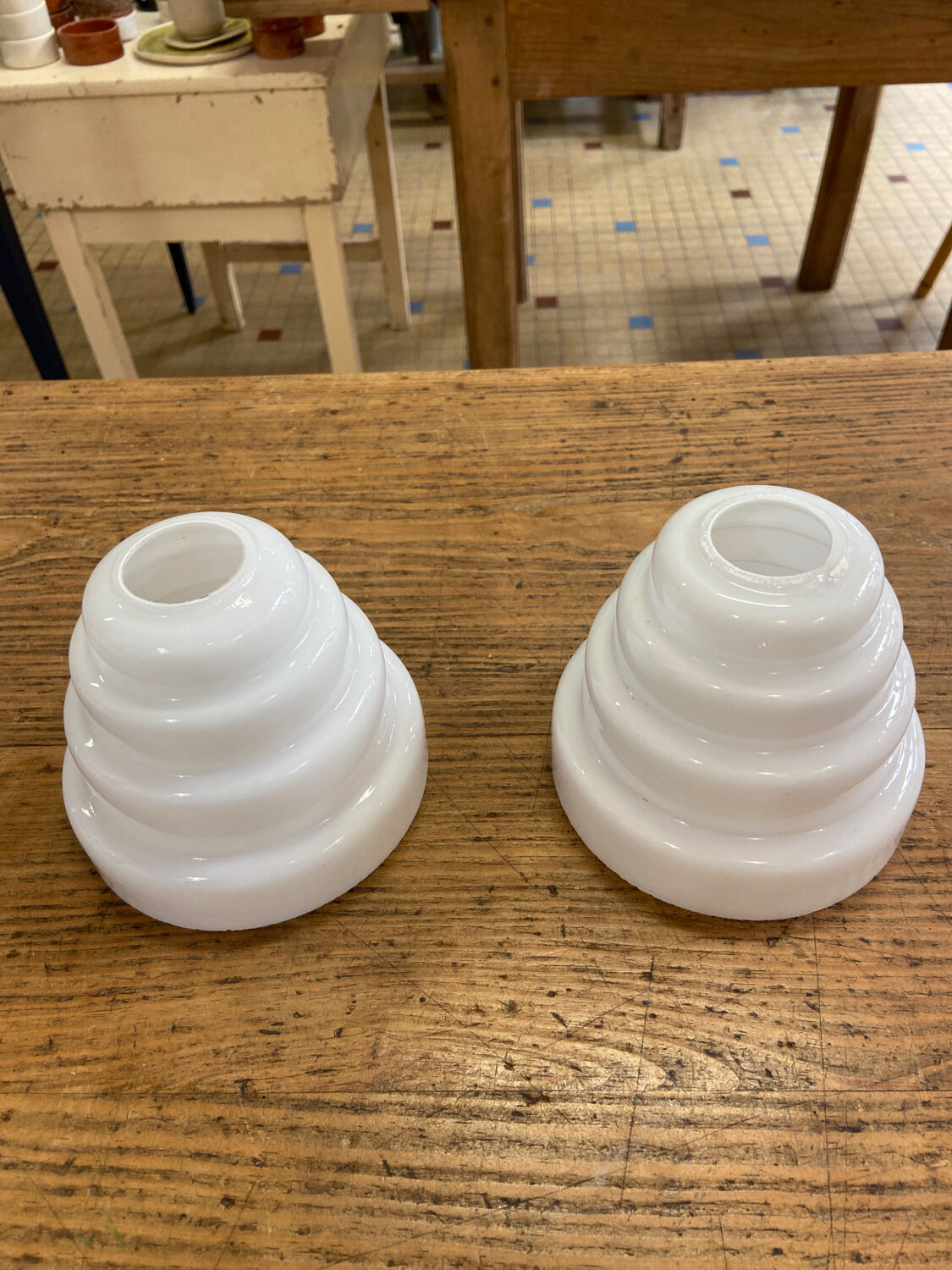 Pair of white glass pendant lights