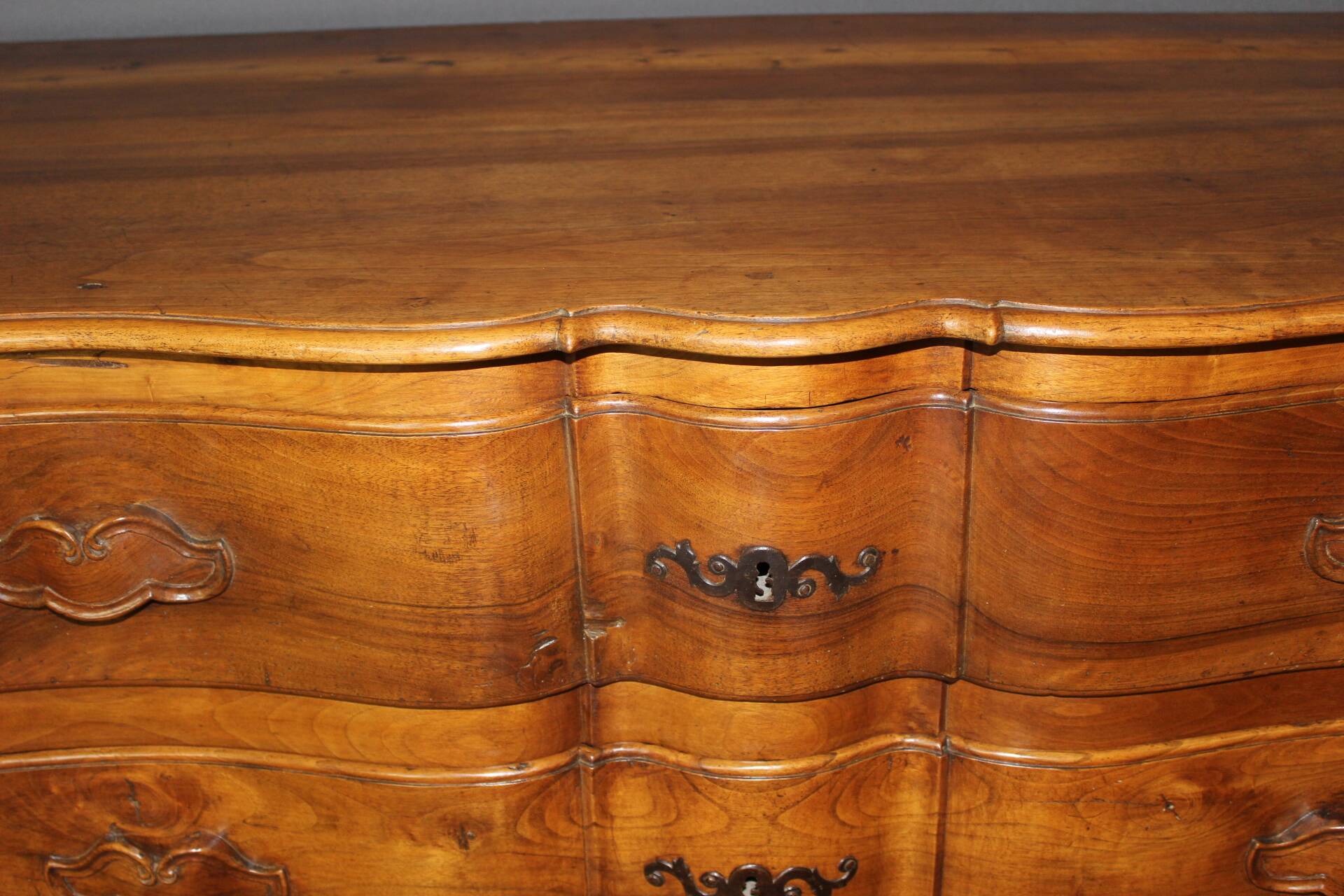 Eighteenth-century walnut crossbow commode.