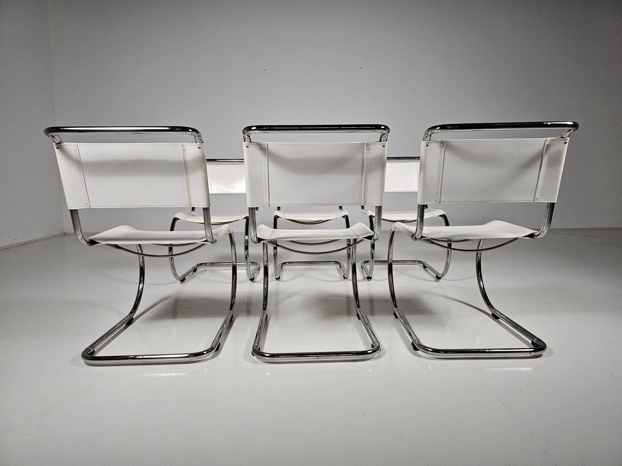 Set of 6 white cantilever dining chairs MR10 by Mies van der Rohe for Thonet, 1980s.