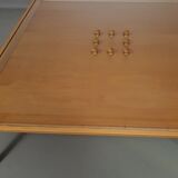 Rare coffee table 110 x 110 x height 35 cm with 8 flange wooden / cork caps in the glass top.