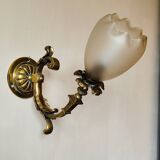 Bronze wall light with opaque glass tulip
