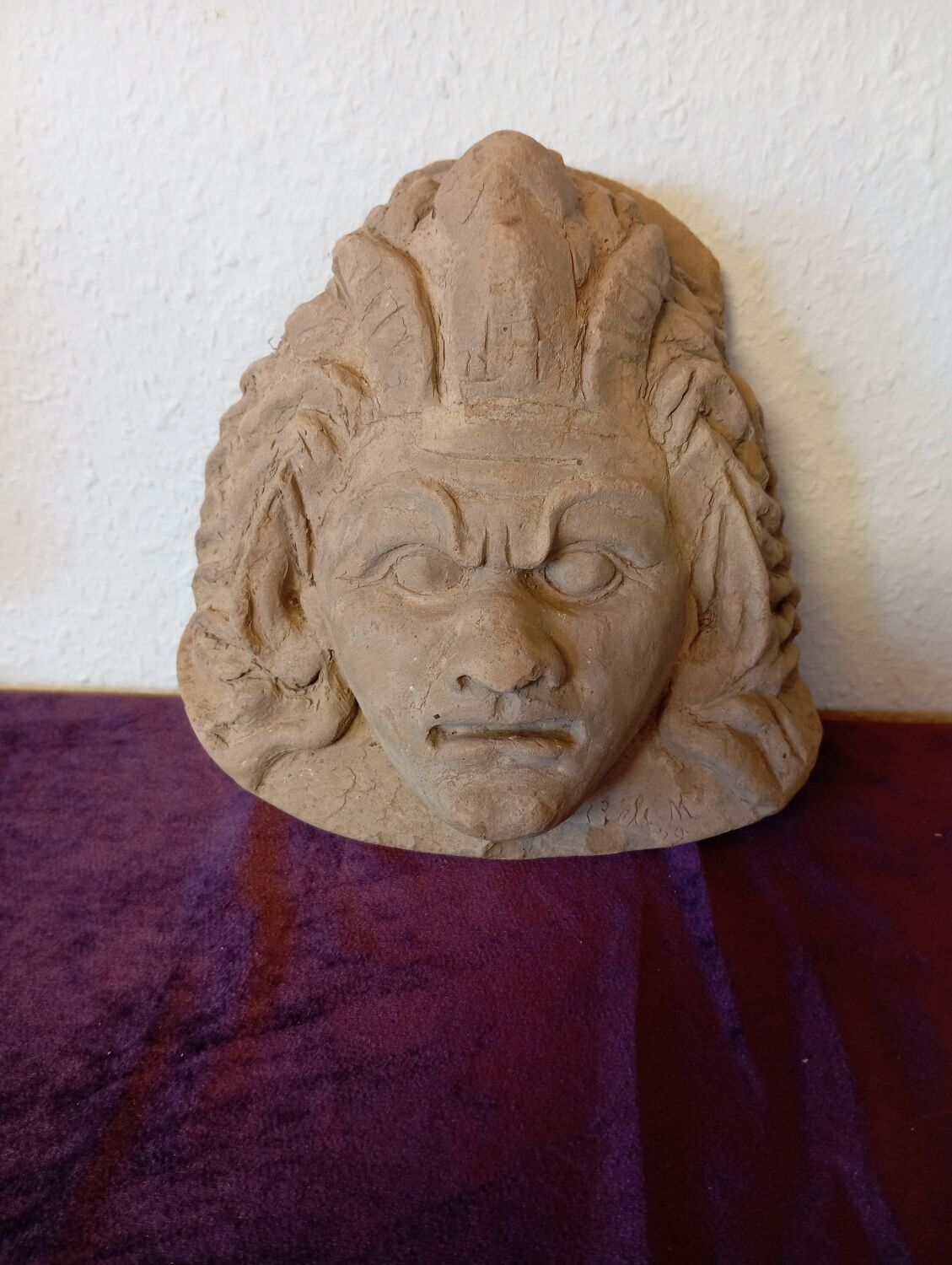Terracotta clay head sculpture