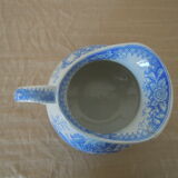 Blue and white ceramic pitcher