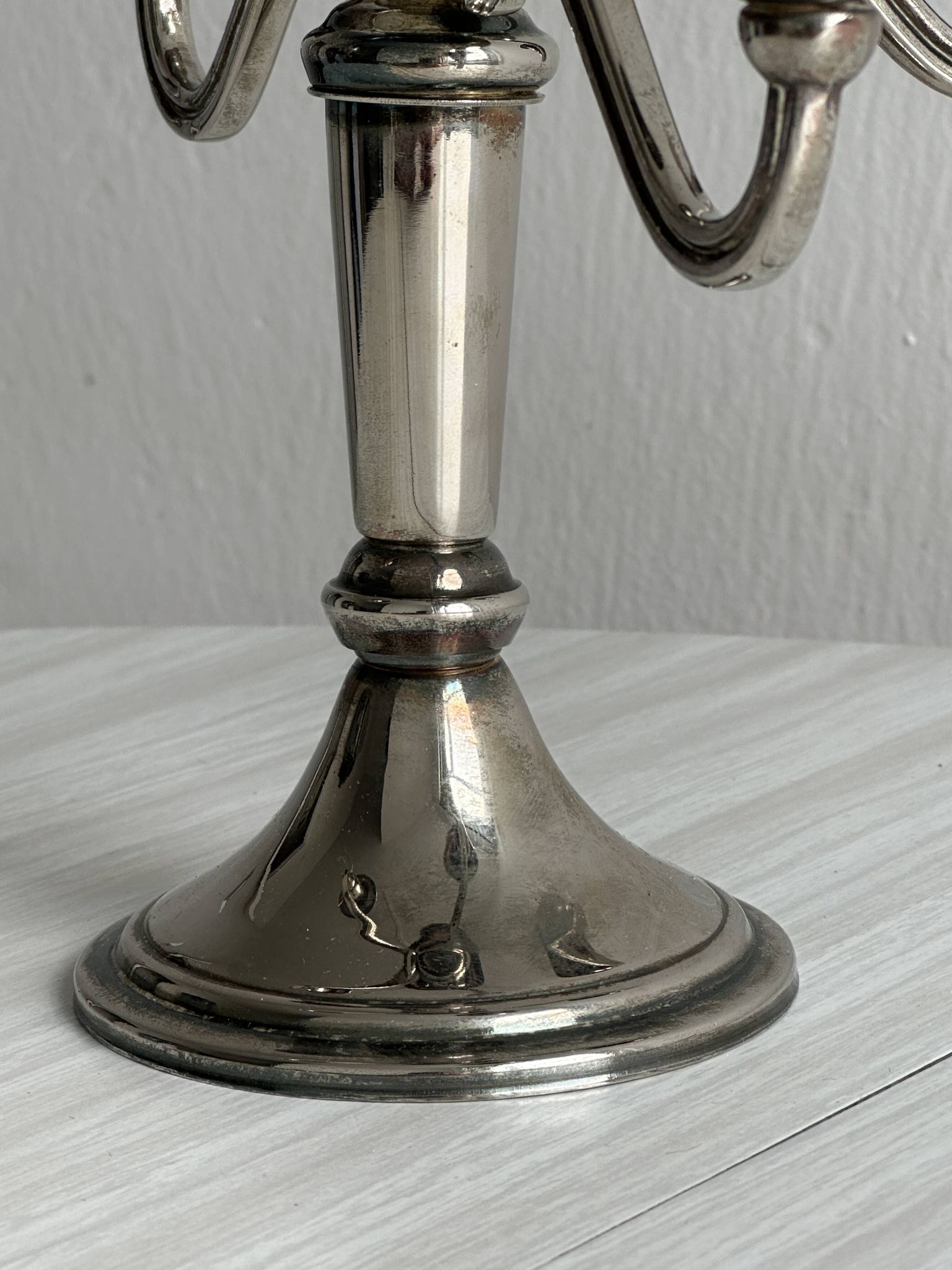 Candlestick candle holder in patinated silver metal