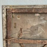 Old oil painting on canvas portrait of a woman with a red bow, late 19th century