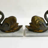Swan bookends on marble