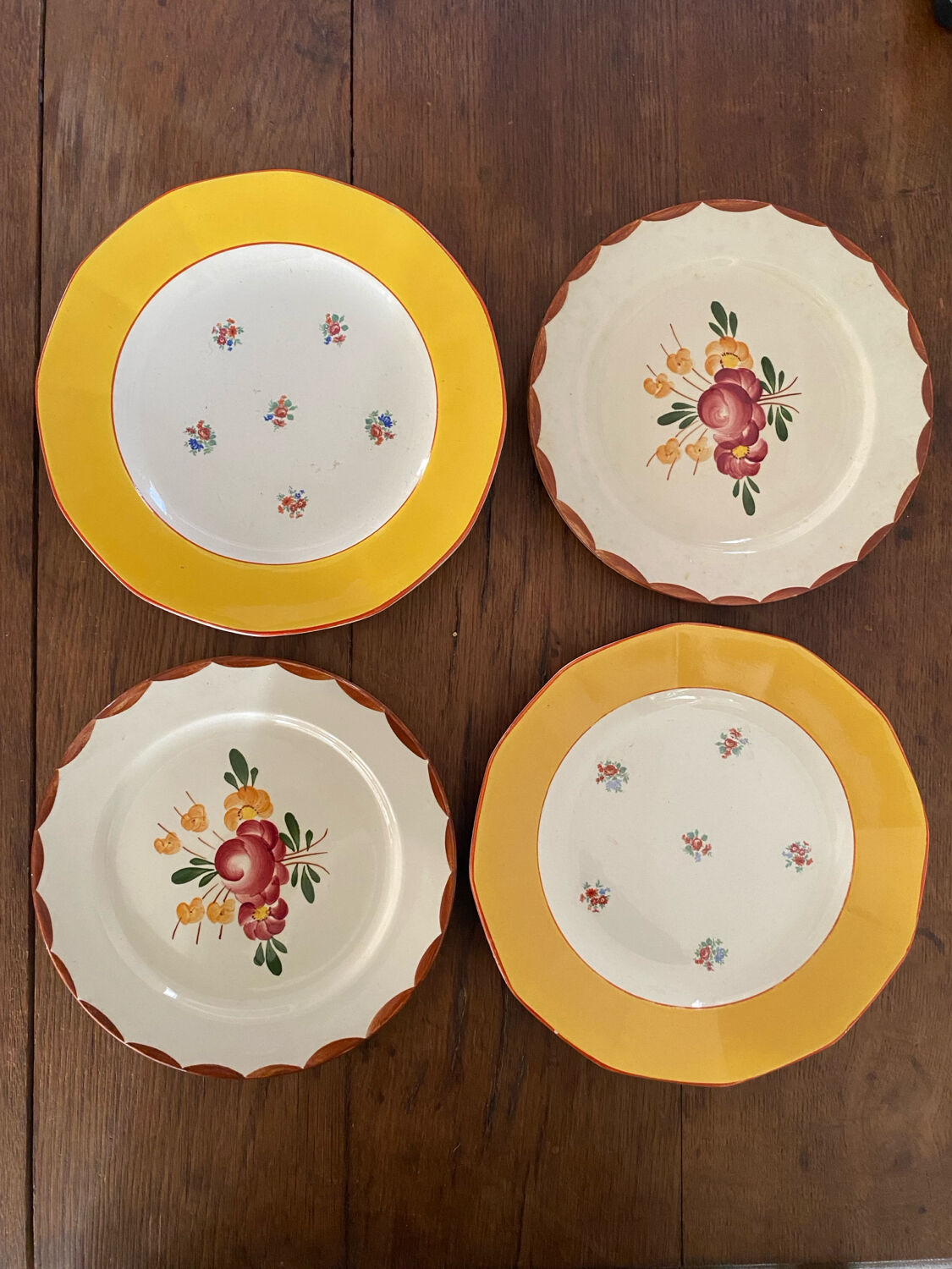 Flowered stamped dessert plates and matching ones.