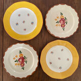 Flowered stamped dessert plates and matching ones.