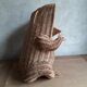 Frog in rattan magazine holder