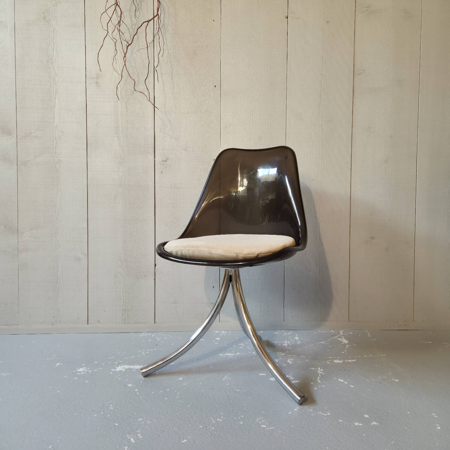 Plexiglas swivel chair