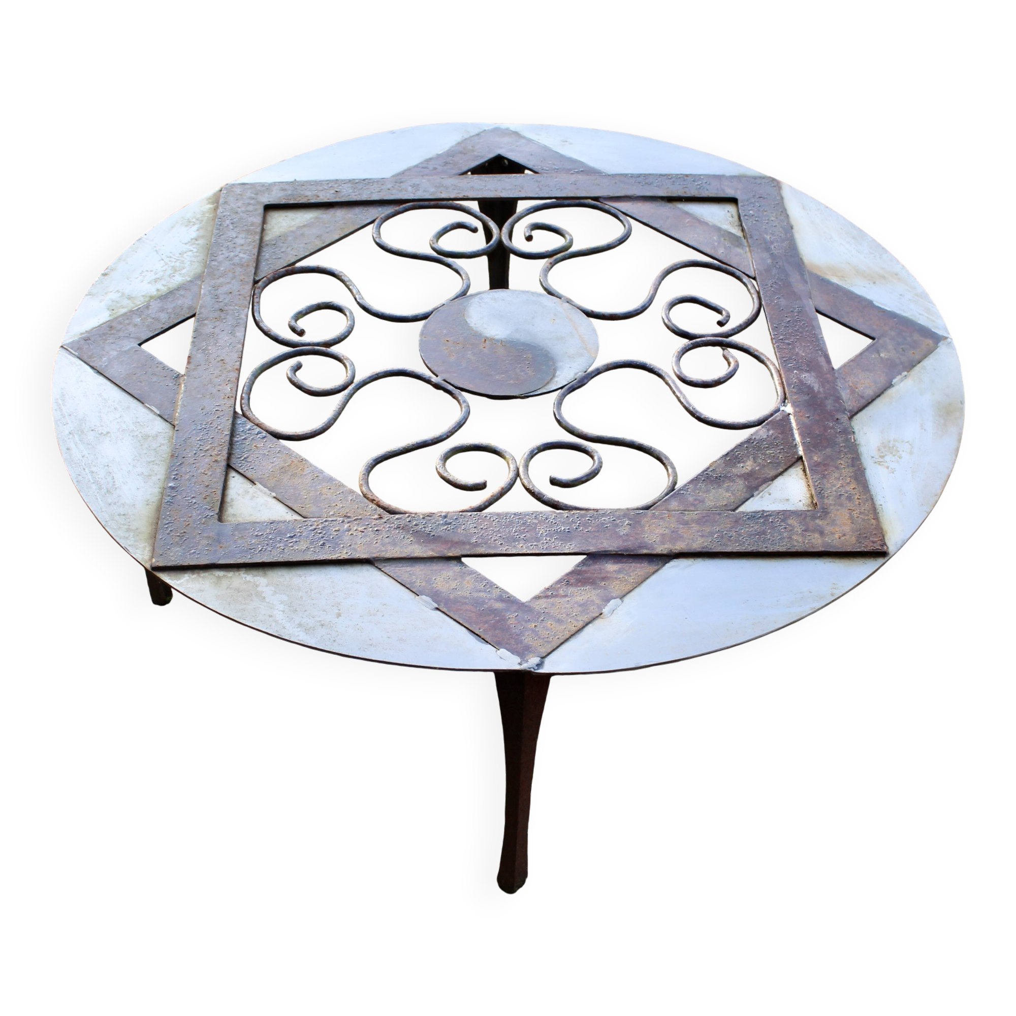Outdoor iron table with yin yang decoration