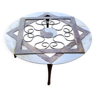 Outdoor iron table with yin yang decoration