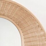 Large concave mirror in woven rattan