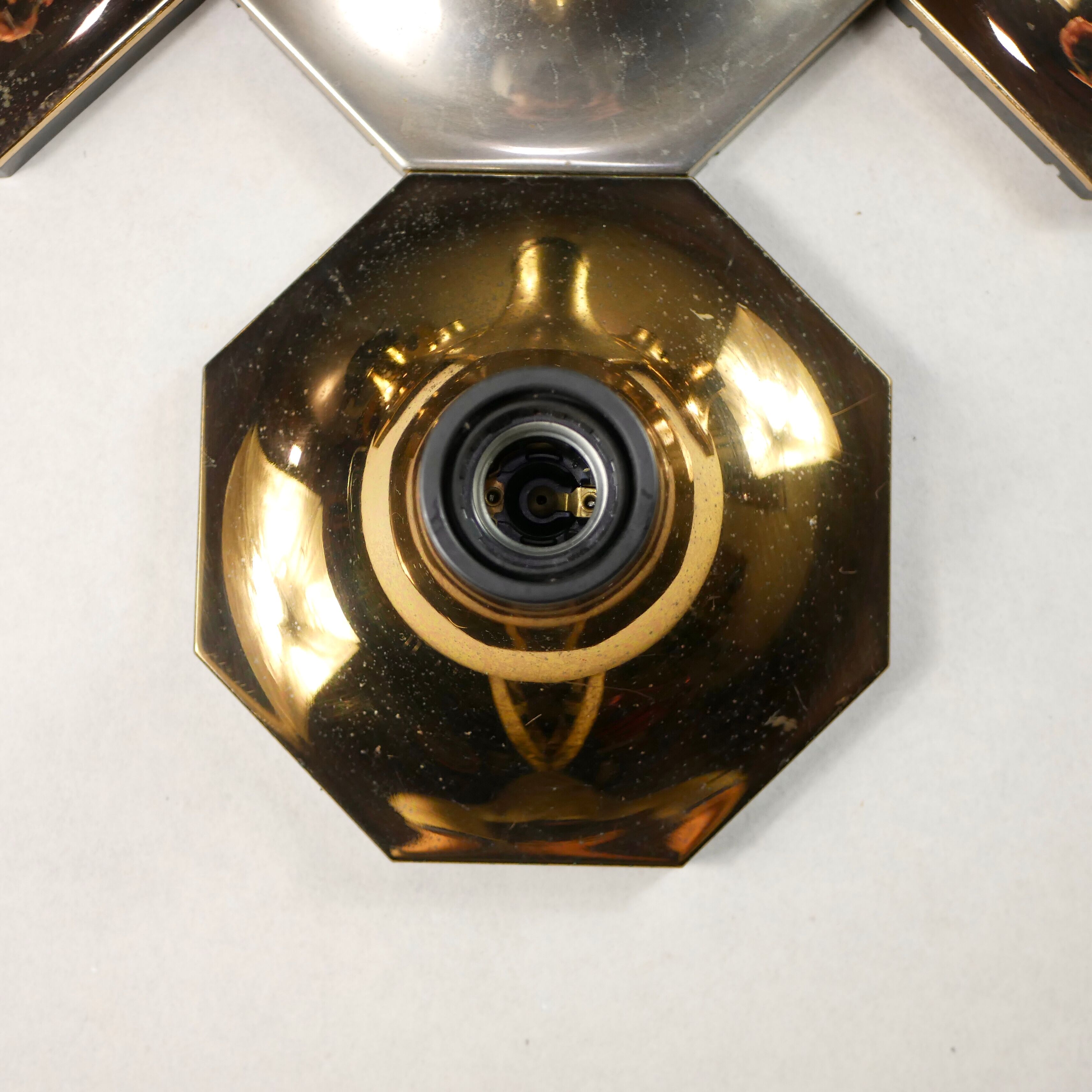 Suite of 11 octagonal brass sconces by Motoko Ishii
