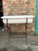Vintage white enamelled iron jardinière with tubular legs - 1930s