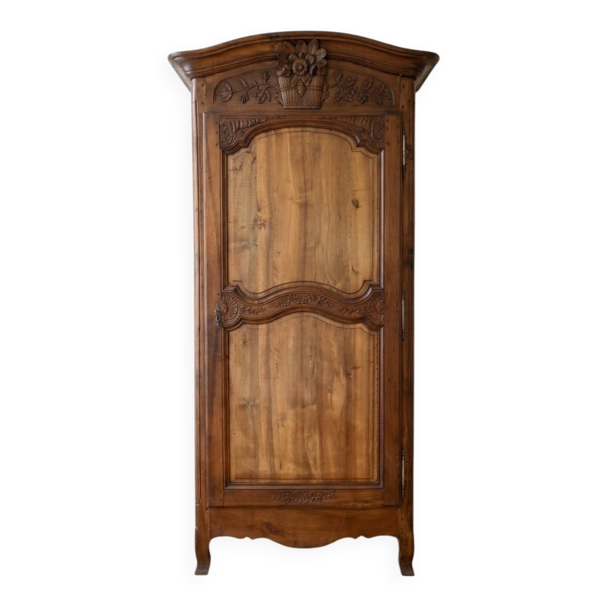 Antique carved wooden wardrobe with cornice.