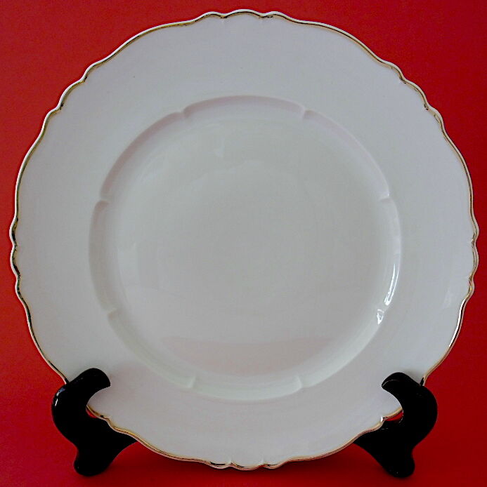 Suite of twelve table plates in white porcelain, golden lip